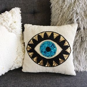 evil eye throw pillow